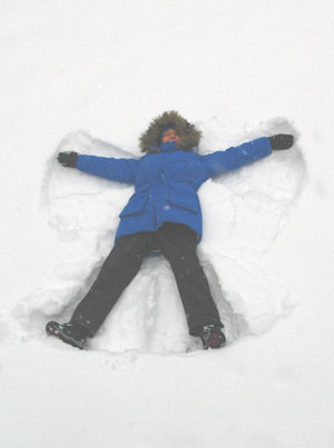 Mary making snow angel